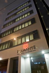 a building with a sign on the front of it at Flamante Hotel & Suite in Lima