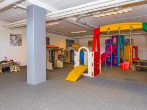 a classroom with a play room with a slide at 6 person holiday home in Glesborg in Glesborg
