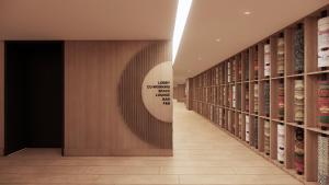 a hallway of a wine cellar with shelves of wine bottles at ASAI Gamuda Cove in Banting +14 photos