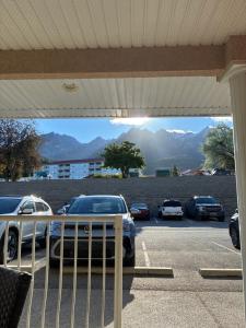 a view of a parking lot with cars parked at Modern Dream at Fairmont in Fairmont Hot Springs