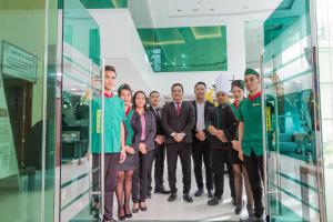 a group of people standing in front of a glass wall at Eurotel Boracay in Boracay