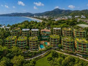 an aerial view of a resort next to the ocean at Kata Sea View Sanctuary in Kata Beach