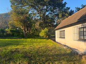 an empty yard next to a house at 399 Place in Umtali