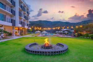 a fire pit in the middle of a lawn in a building at Gapyeong the Bay Resort in Gapyeong +28 photos