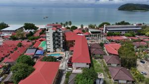 an overhead view of a city with red roofs at Amzar Motel Cenang in Pantai Cenang