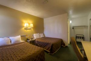 Krevet ili kreveti u jedinici u objektu Americas Best Value Inn Amarillo Airport/Grand Street