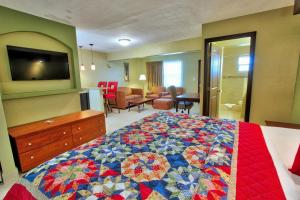 TV a/nebo společenská místnost v ubytování Oceans Beach Resort & Suites