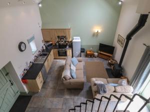 an overhead view of a living room and kitchen at No 1 The Granary in Llangefni