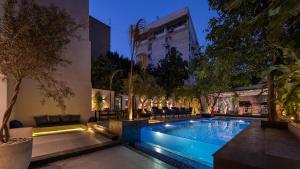 a swimming pool in the middle of a building at Exclusive savings at 22 by spacey #43 Studio in Maadi in Cairo