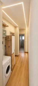 a kitchen with a washer and dryer in a room at Limera View Monemvasia in Monemvasia