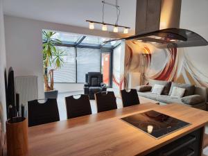 a living room with a table and chairs at Apartmány Duo in Dačice