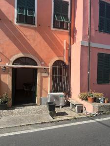 a building with an open door with a heater in it at Cà Bartolomeo in Finale Ligure