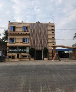 a building with a playground in front of it at SWAYAMSIDDHA continental in Kendrāparha