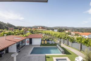 a view of the backyard of a house with a swimming pool at Olive Studios in Campo de Arca