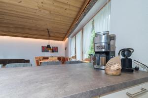 a coffee maker sitting on top of a counter at Haus Gant in Sankt Gallenkirch