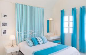 Ένα ή περισσότερα κρεβάτια σε δωμάτιο στο Meli Meli 