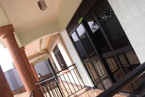a view of the front doors of a house at Crown Suites Motel in Masaka
