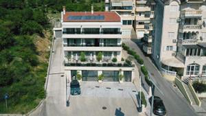 an aerial view of a building with a parking lot at Casa Nuova in Kotor