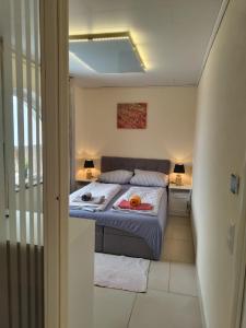 a bedroom with a bed in a room at FeWo bei Tati - Bungalow in Singen +44 photos