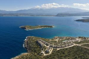 an aerial view of an island in the ocean at JW Marriott Crete Resort & Spa in Marathi +84 photos