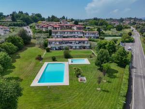 an aerial view of a large estate with a swimming pool at MGH Luxury- Romantic SPA & Relax in Poiano