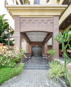 a entrance to a building with a door at Metro Apartments in Lagos