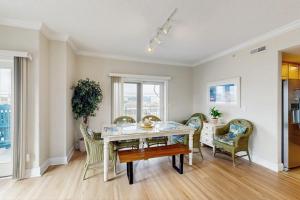a dining room with a table and chairs at Condo 4100 #201 in Ocean City
