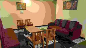 a living room with a couch and two chairs at Hill Mountain Hotel in Chakarpur +7 photos
