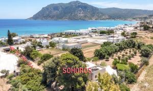 an aerial view of the city of soros and the ocean at Hamilton - Sohoros in Kámpos