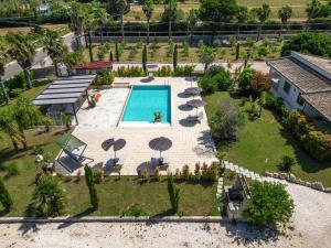 an aerial view of a resort with a swimming pool at Agriturismo Li Frutti in Otranto