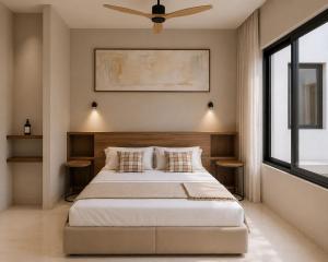 a bedroom with a bed and a ceiling fan at Nommadas Cotty - Only Adults in Denia