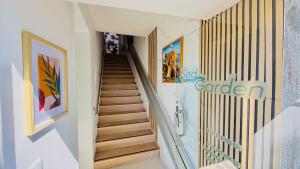 a hallway with stairs in a house at Sea Garden Peniche in Peniche