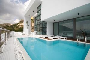 a swimming pool in a house with a view at Altea Hills Luxury Villas in Altea