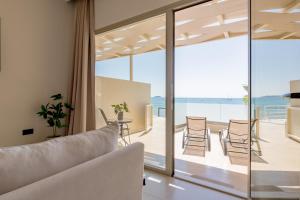 a house with a view of the ocean at Blue Horizon Studios in Laganas