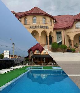 a large building with a swimming pool in front of it at Aqua Hotel in Solotvyno