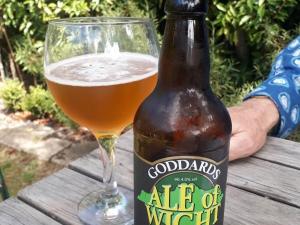 a bottle of beer sitting next to a glass at One Holyrood Hotel in Newport +75 photos