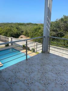 a view from the balcony of a house at Roof View Macaneta in Praia de Macaneta +10 photos