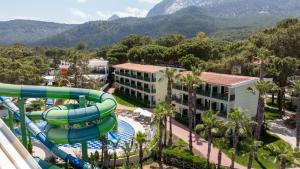 an image of a water slide at a resort at Crystal Flora Pearl Collection - Ultimate All Inclusive in Beldibi