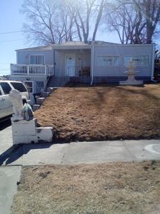 a house with a yard with a fire hydrant at Cws seperate entrance in Omaha