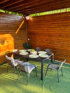 a table and chairs sitting on a patio at Hellena in Sarajevo