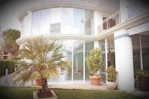 Vonkajšia záhrada v ubytovaní Hotel & Apartaments Thalassa Sport & Spa
