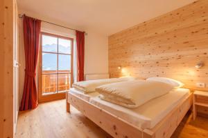 Кровать или кровати в номере BIO Ranerhof
