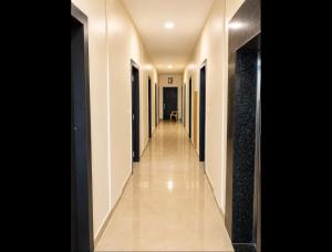 a hallway of a building with a long corridor at Udaigarh Palace - The Heritage Hotel in Jodhpur