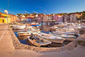 a bunch of boats are docked in a harbor at Rooms LuaMar in Sali