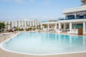 a large swimming pool in front of a building at 1316 Paraiso Sur, Amazing view in Playa Paraiso