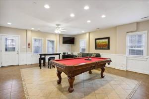 a living room with a pool table in it at Dream Catcher - Nags Head MP 12, Oceanfront, Elevator, Pool, Hot Tub, Pets OK, YR Flex in Nags Head