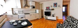 Kuchyňa alebo kuchynka v ubytovaní Apartamentos Albero