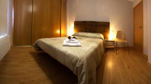 Posteľ alebo postele v izbe v ubytovaní Apartamentos Albero