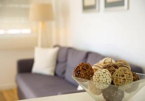 a glass bowl filled with eggs on a table at SeaBreeze City Center Flats by TrulyCyprus in Limassol