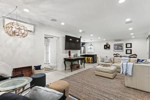 a living room with a couch and a table at Battery Place in Savannah